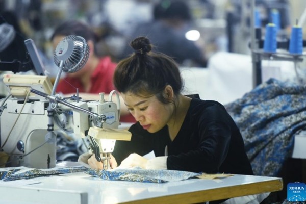 Chinas industrial profit growth quickens despite COVID-19 resurgence