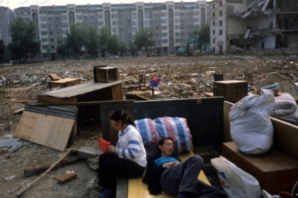 China cuts poor population by two-thirds